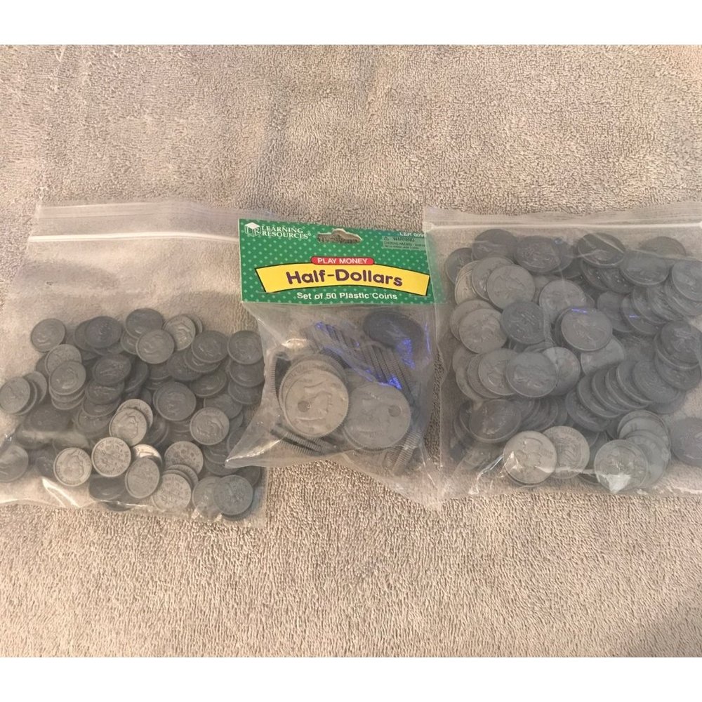 Plastic quarters, nickels, and half doll